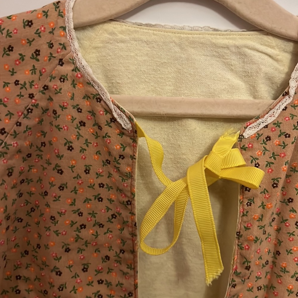 Lace neck detail small floral print two toned tie bows in back. - Picture 3 of 3